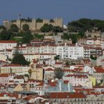 A view of hilly Lisbon, topped by São Jorge Castle, from a lookout in the Bairro Alto district.