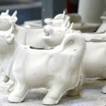 At the Cerâmicas de Coimbra factory, I loved this little herd of plaintive clay cows, on their way to becoming creamers.