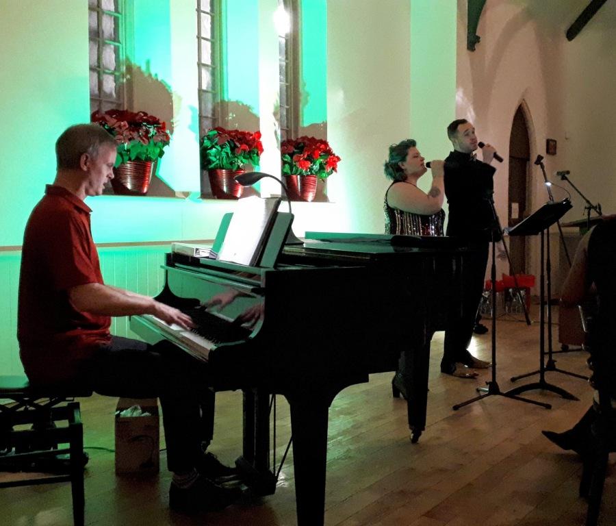 Singers Lesley Bouza and Jordan Scholl, accompanied by pianist Ross Inglis, gave an outstanding musical performance, amidst the Schoolhouse's Gothic-revival architecture.
