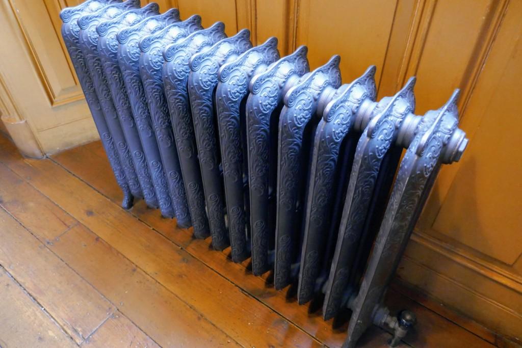 Cast iron radiators, extremely similar in design to those at John McKenzie House (1913) in Toronto.