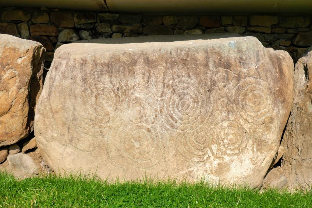 Spirals carved in stones surrounding Knowth.