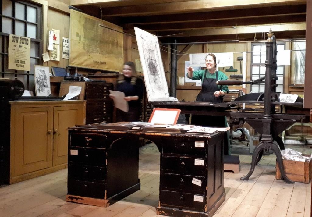 Program Officer Danielle Urquhart in the print shop at Mackenzie House, teaching us to use the 1845 Washington flatbed printing press (how cool is that??).