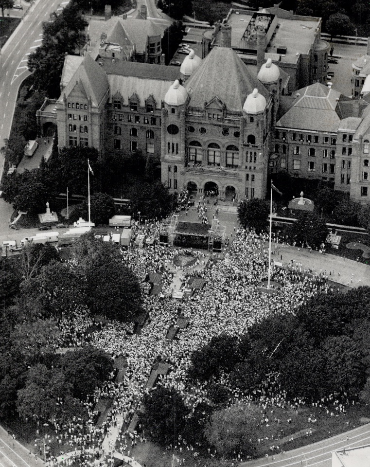 June 18, 1990. A crowd of 30,000 packs the lawn outside the Ontario Legislature building (Queen's Park) in Toronto, to hear Nelson Mandela's speech. - Rick Eglinton / Toronto Star file photo courtesy Toronto Public Library