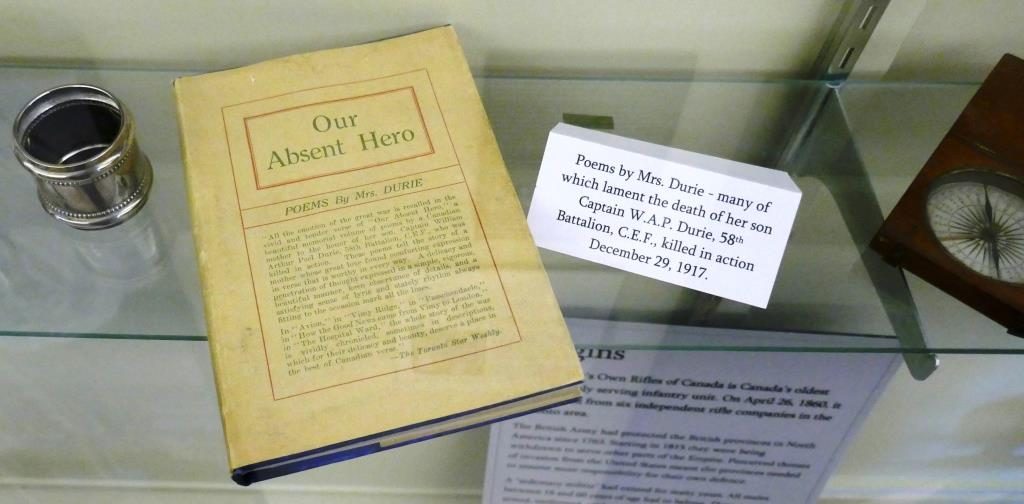 Why is is this book, "Our Absent Hero" by Mrs. Durie, on display at the Queen's Own Rifles Museum