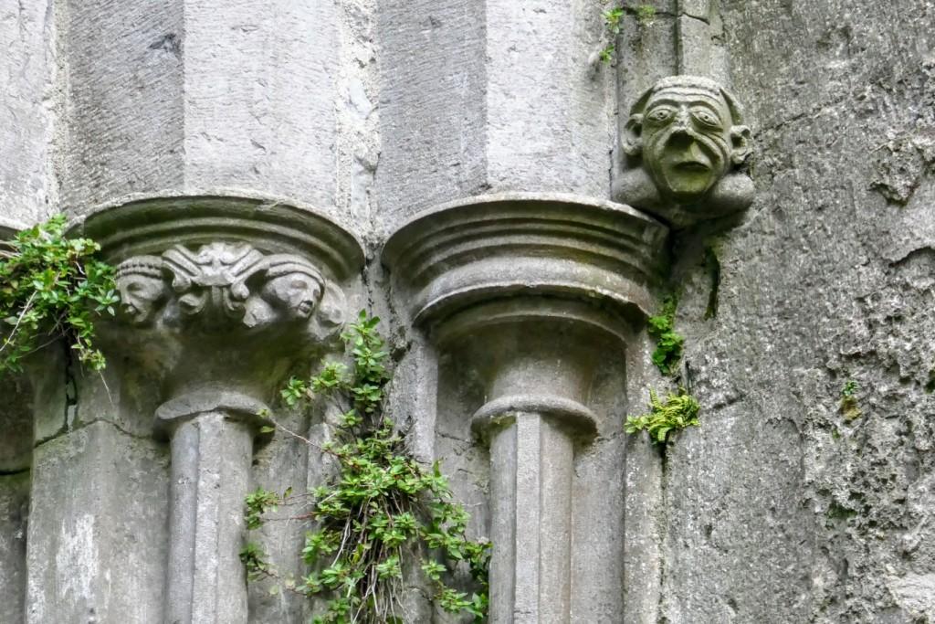 Look up! Figures in the corbels and tops of columns in the cathedral at the Rock of Cashel.